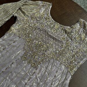 Elegant Beaded Gown with Gold Accents